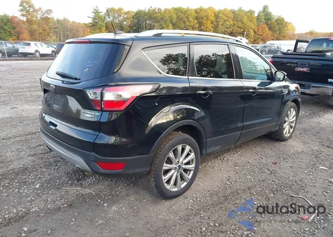 2017 Ford Escape Titanium z USA, uszkodzony, nr VIN 1FMCU9JD2HUD71023